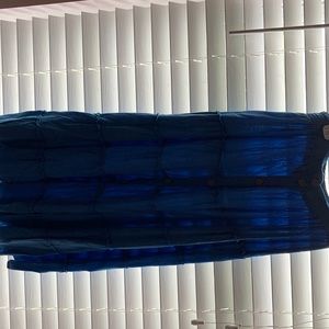 A blue flowy skirt with buttons